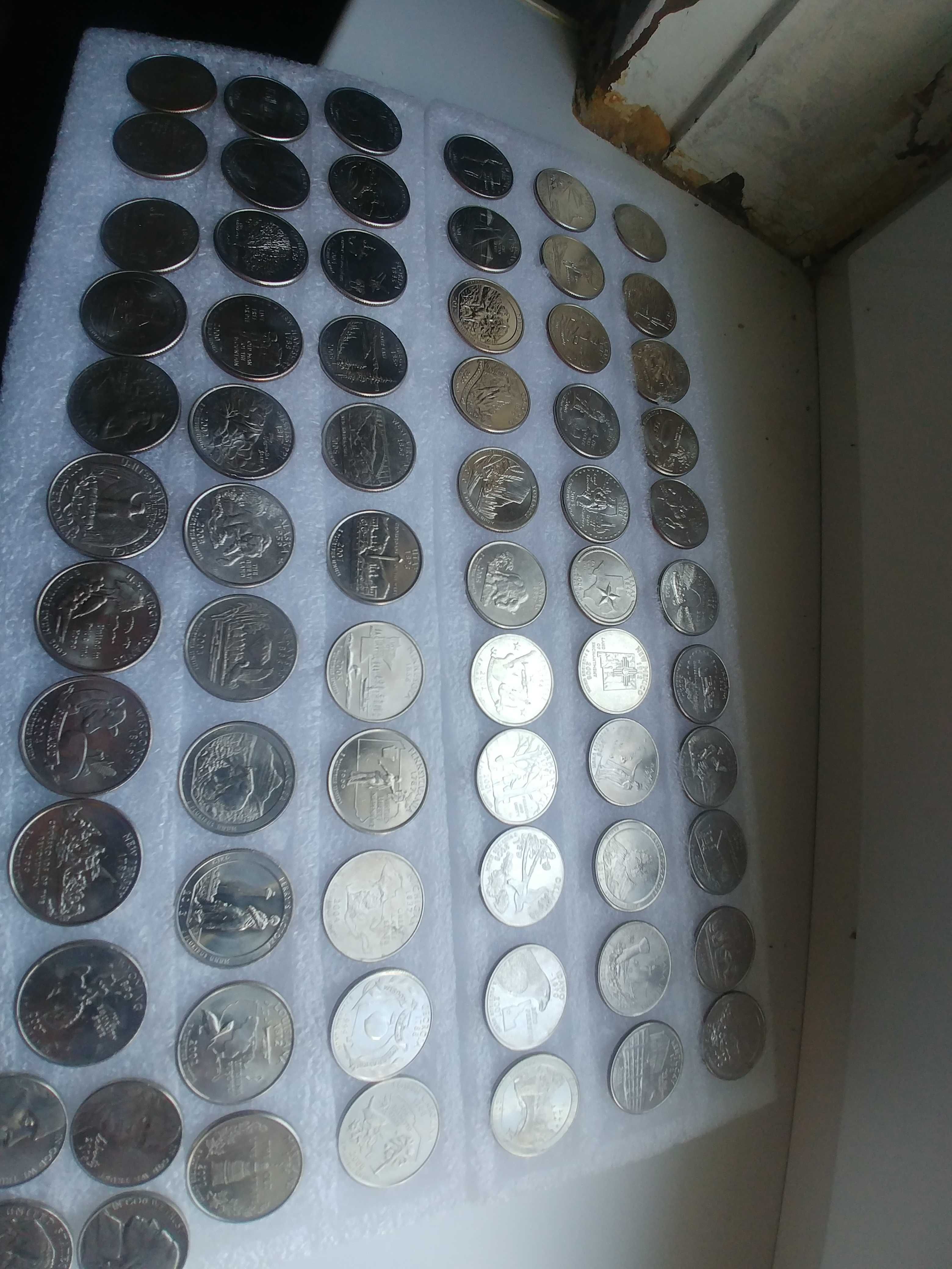 25-центовые монеты(65 шт.и 4шт. 5-центовые)