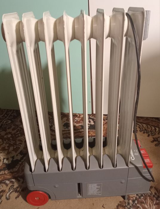 Масляный обогреватель с обдувом винтелятором