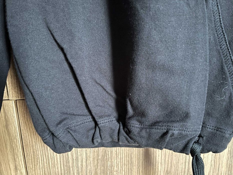 Spodnie dresowe damskie czarne Reebok modelujące bawełna 100 %