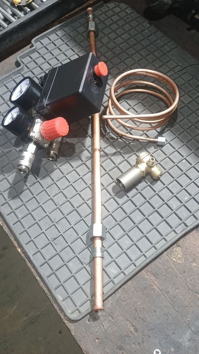 Обратний клапан на компресора