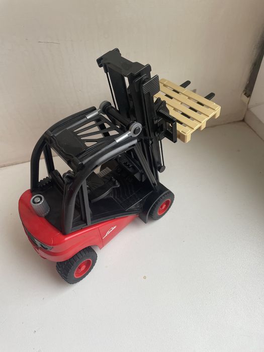 Bruder іграшка навантажувач погрузчик Linde H30D с паллетами
