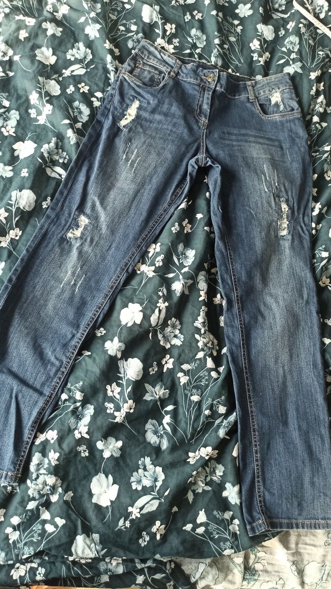 Spodnie jeans jeansy rurki z cekinami obcisłe z przetarciami z rozdarc