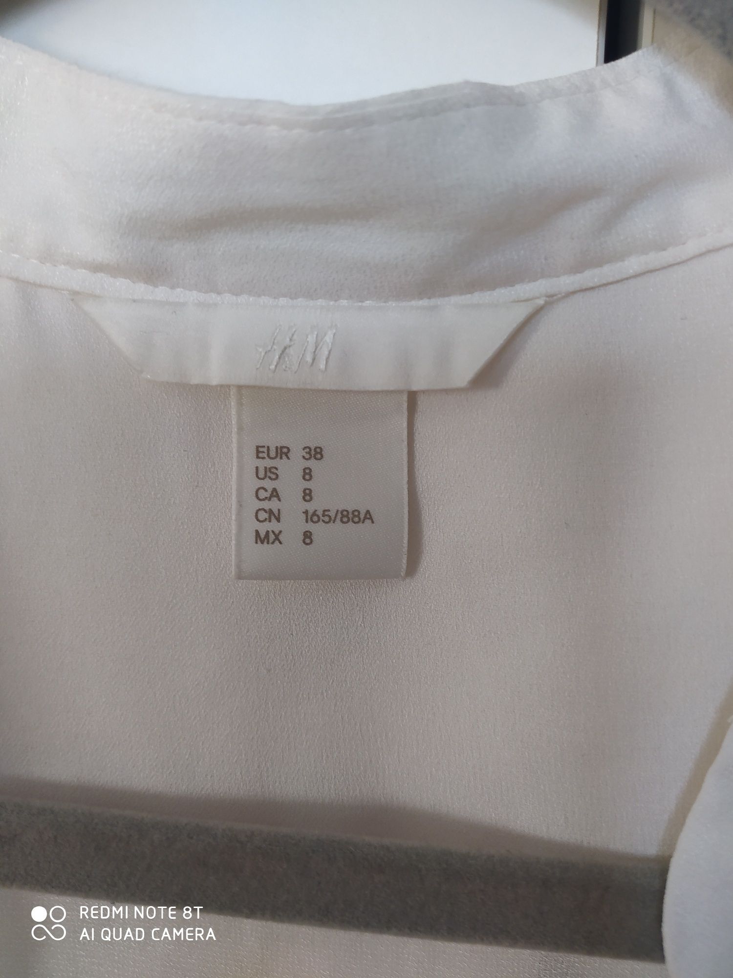 H&M biała bluzka na stójce, rozmiar 38