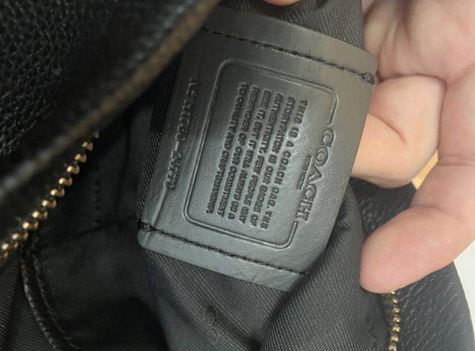 Mala coach nova com saco e alca