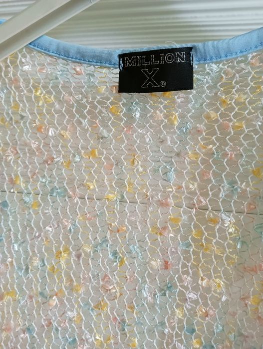 Śliczna kolorowa ozdobna kamizelka