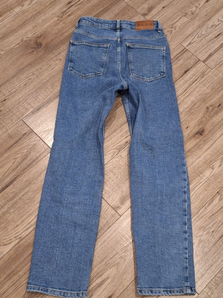 Spodnie jeansy marki NA-KD roz. 34