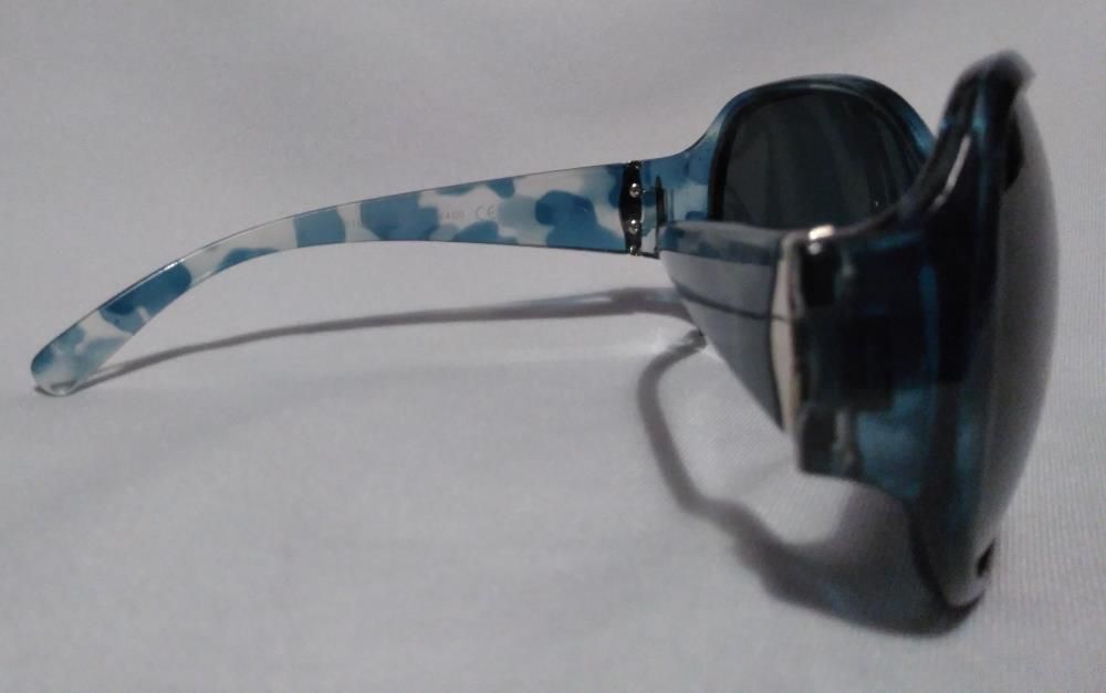 Oculos de sol senhora