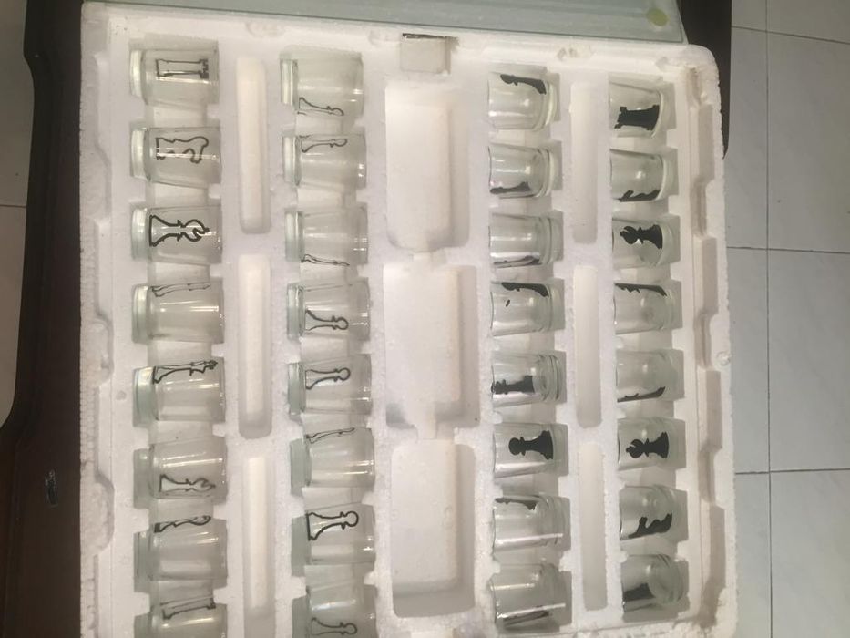 Jogo de xadez em vidro