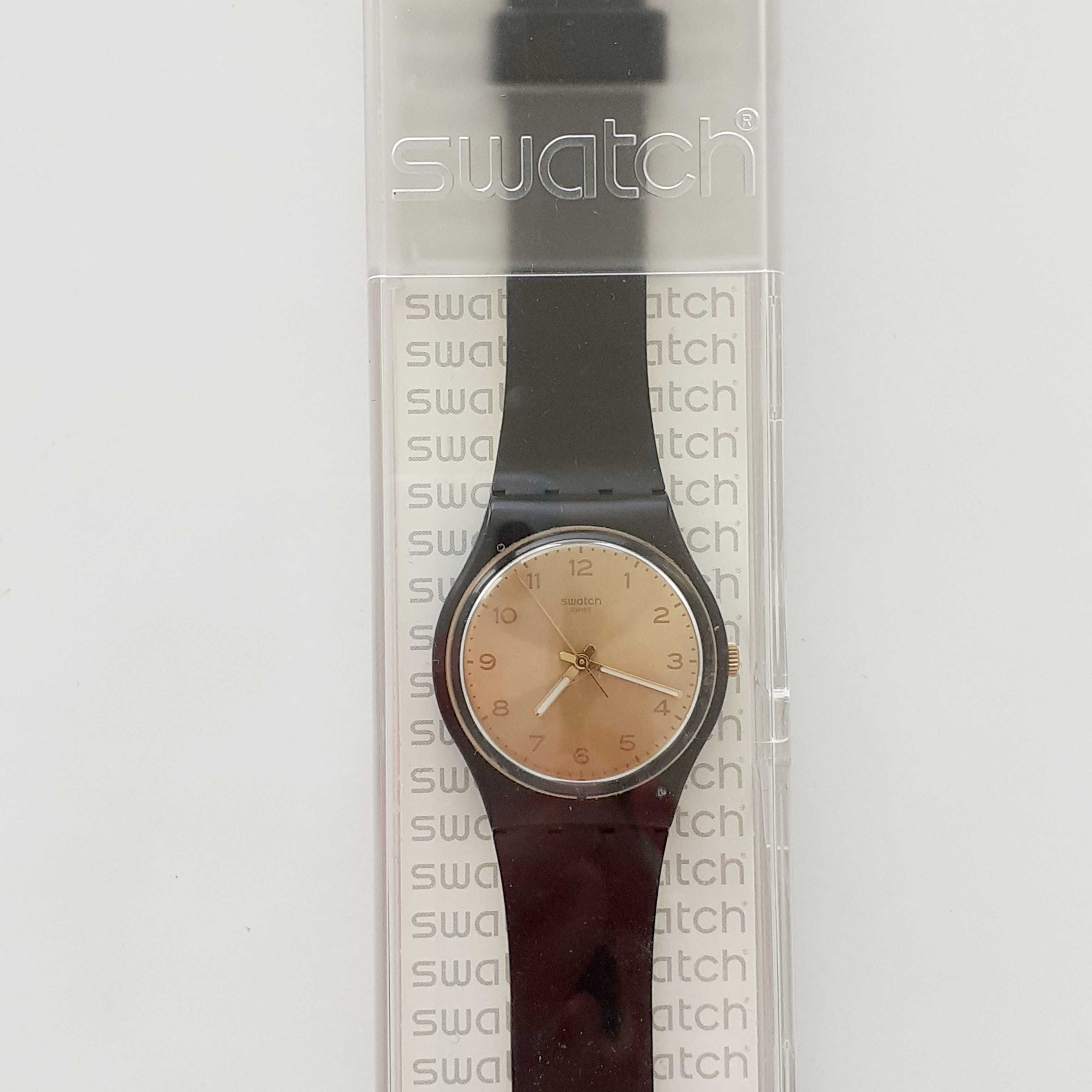 Zegarek Swatch ze złotym cyferblatem