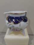 Peça em Porcelana pintada à mão