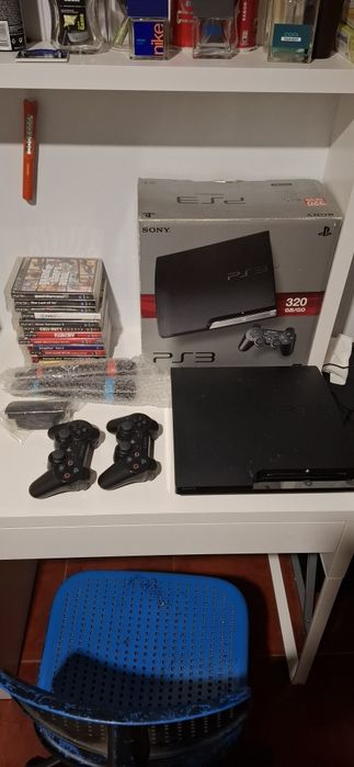 PS3 Slim 320 GB + 2 comandos + 2 microfones + 12 jogos + caixa e manua