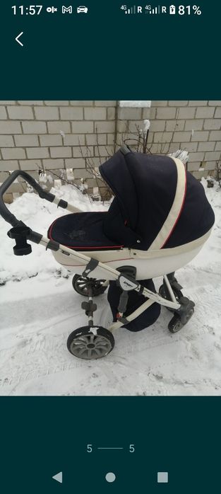 ДИТЯЧА колиска на великих колесах