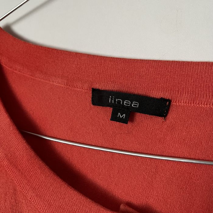 pomarańczowy krótki sweterek sweter crop top linea