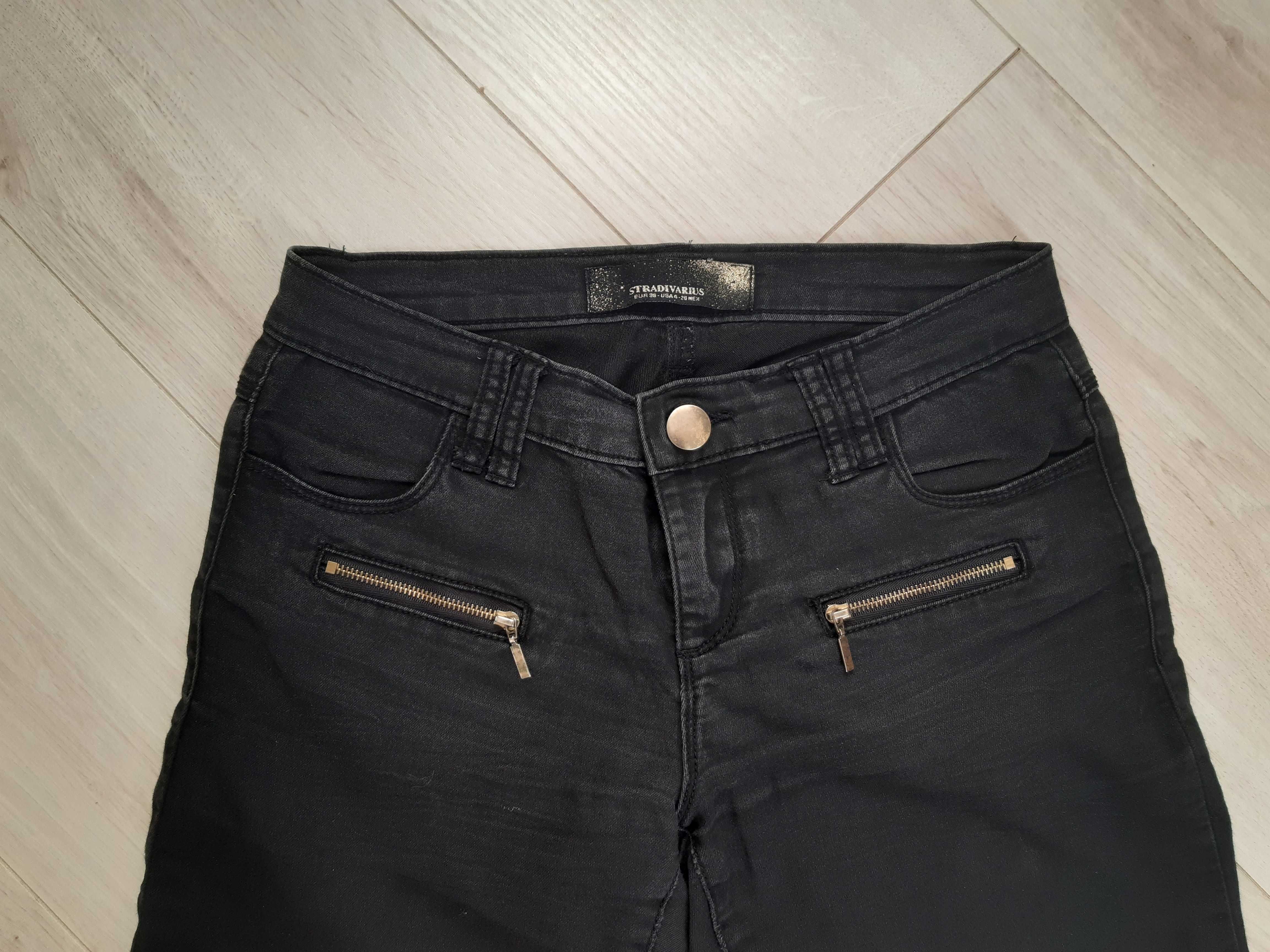 Spodnie jeansy czarne z zamkami na nogawkach Stradivarius 36