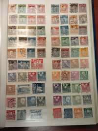 Klaser ze znaczkami pocztowymi,znaczki świata.
