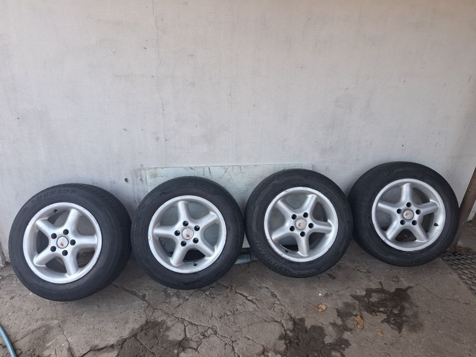 Диски шини ауді пасат гольф шкода титани r15 195/65