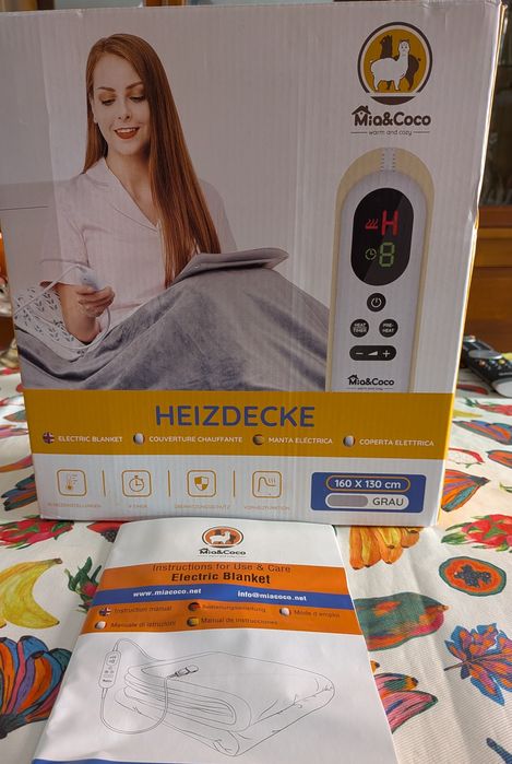 Cobertor elétrico cinzento aconchegante