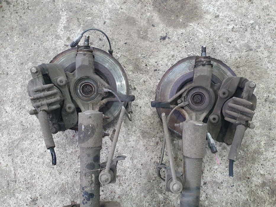 Amortyzator zwrotnica piasta zacisk przód Peugeot 308 T7 1.6 120km