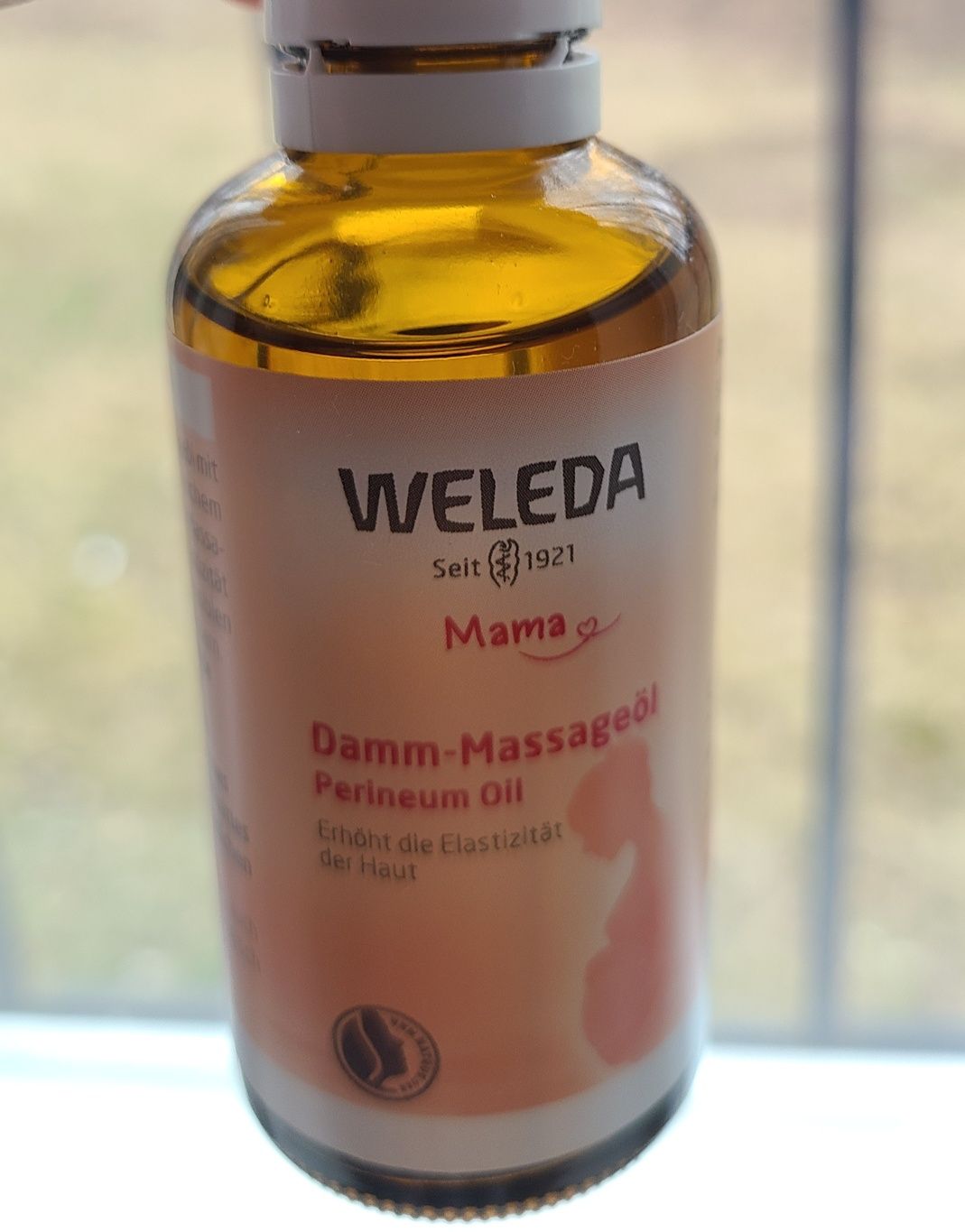 Масло олійка Weleda для профілактики розривів під час пологів