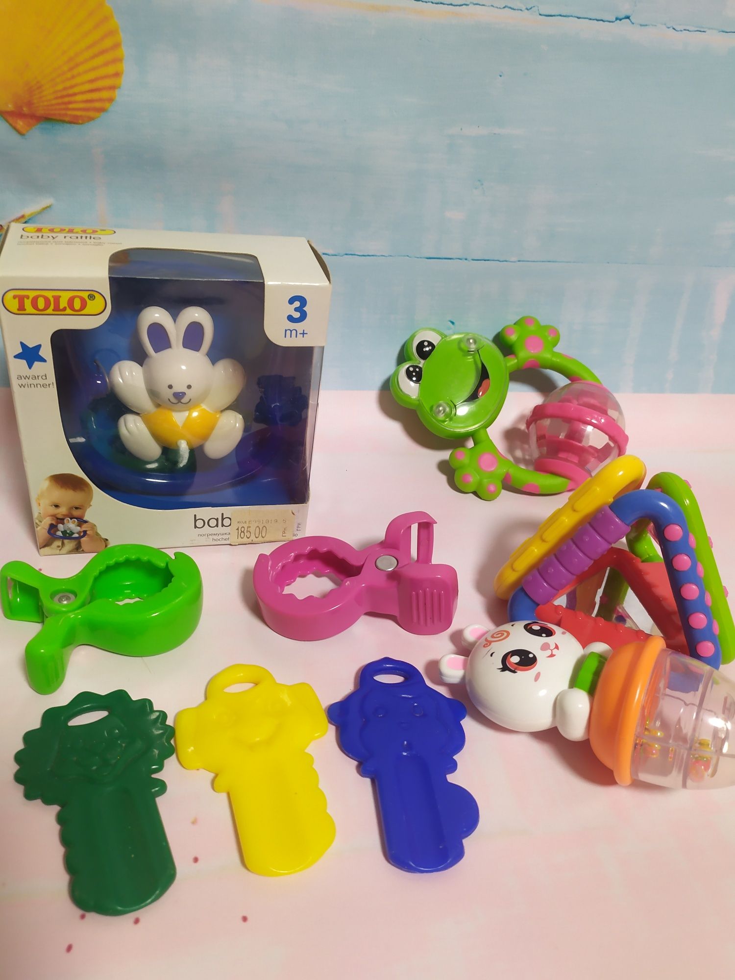 Іграшки для малюка погремушки брязкальця каталка Chicco Tolo пакет