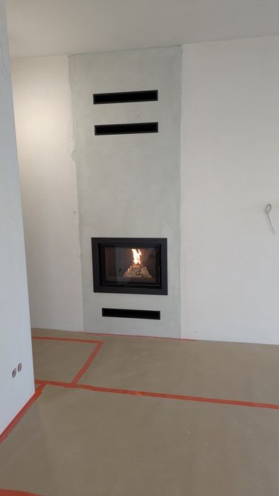 Nowoczesny kominek do rekuperacji z zabudową.