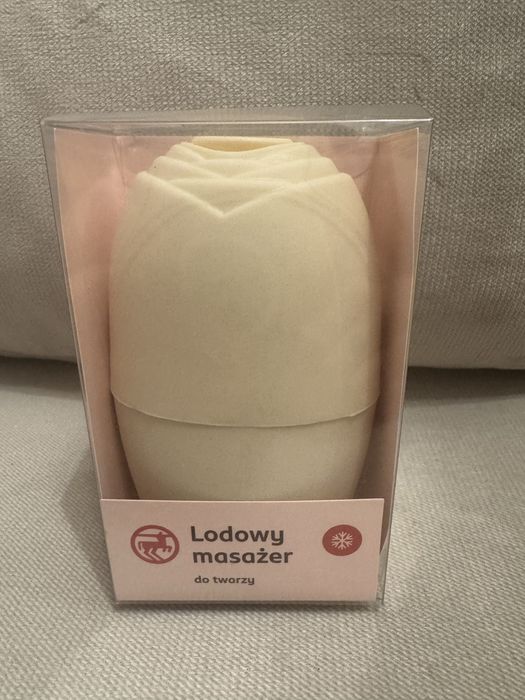 Lodowy masażer do twarzy w pudrowym różu