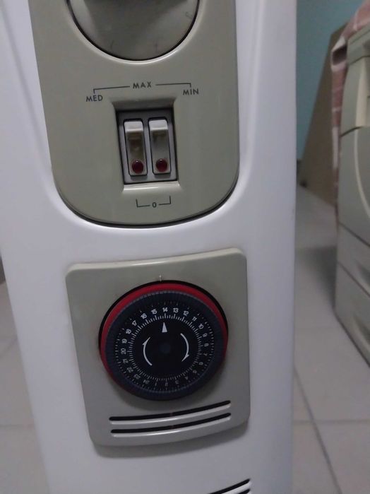 Масляный обогреватель итальянский Delonghi