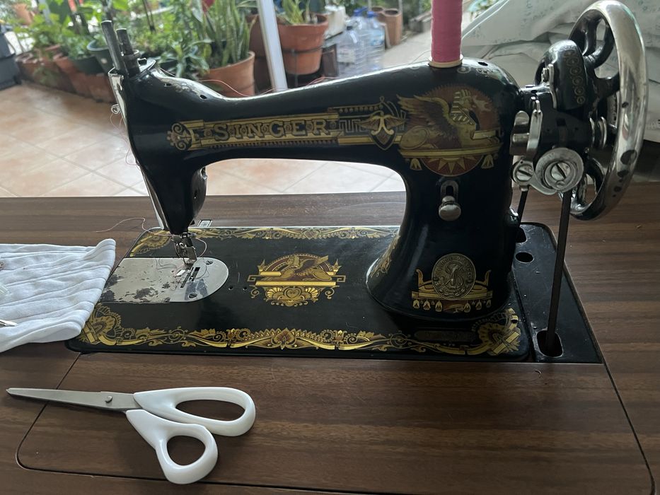 Maquina de costura singer