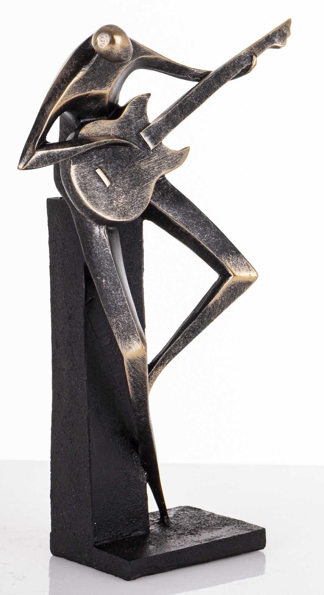 Czarna złota figurka muzyka grającego na gitarze dekoracja 175696