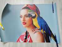 Plakat / poster / obraz kobieta w turbanie z papugą na ramieniu.