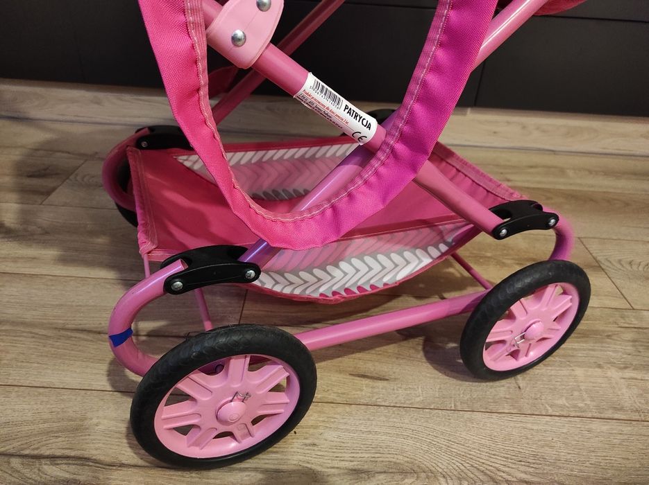 Wózek dla lalek z lalką