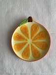 Prato em forma de fruta laranja