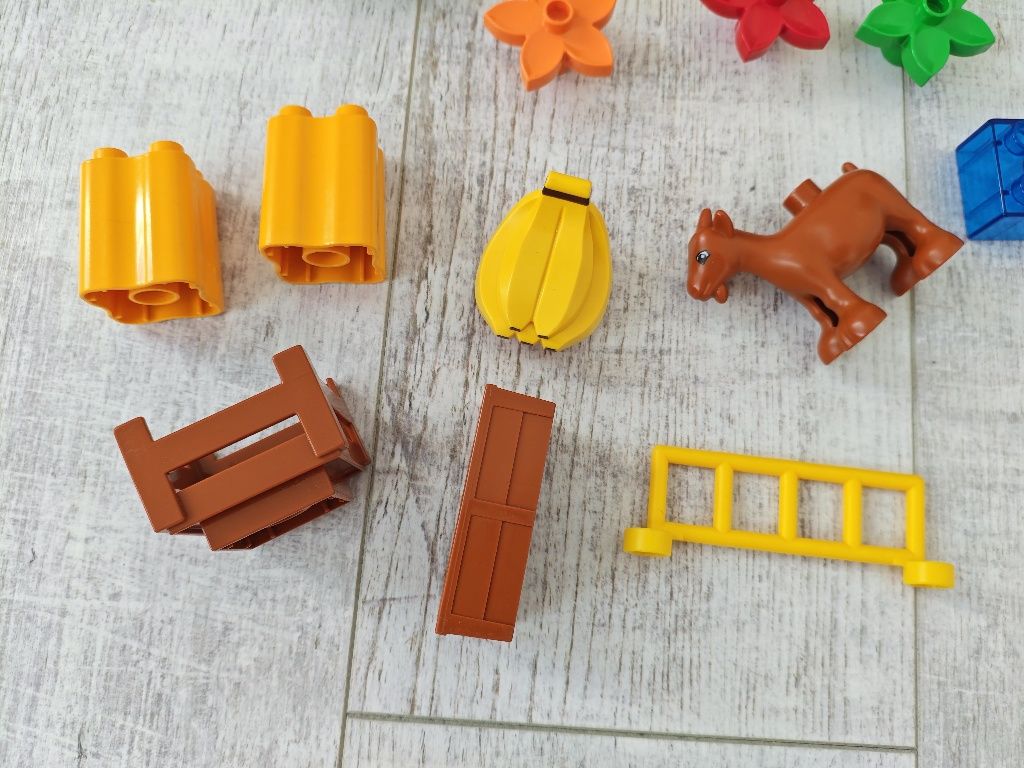 Lego Duplo figurka koza kwiaty koryto banany skrzynka zestaw