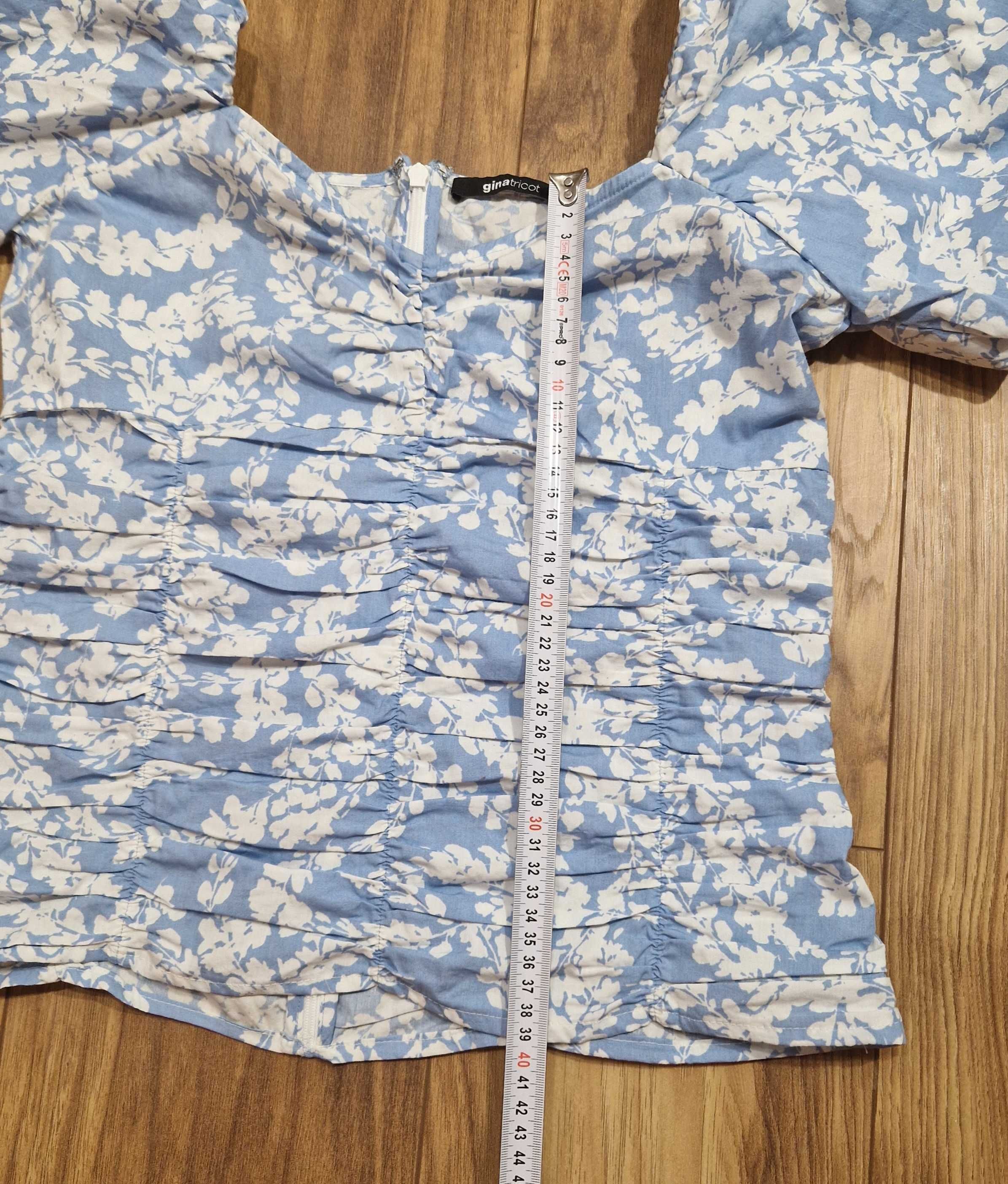 Krótka niebieska bluzka z bufiastymi rękawami rozmiar 38