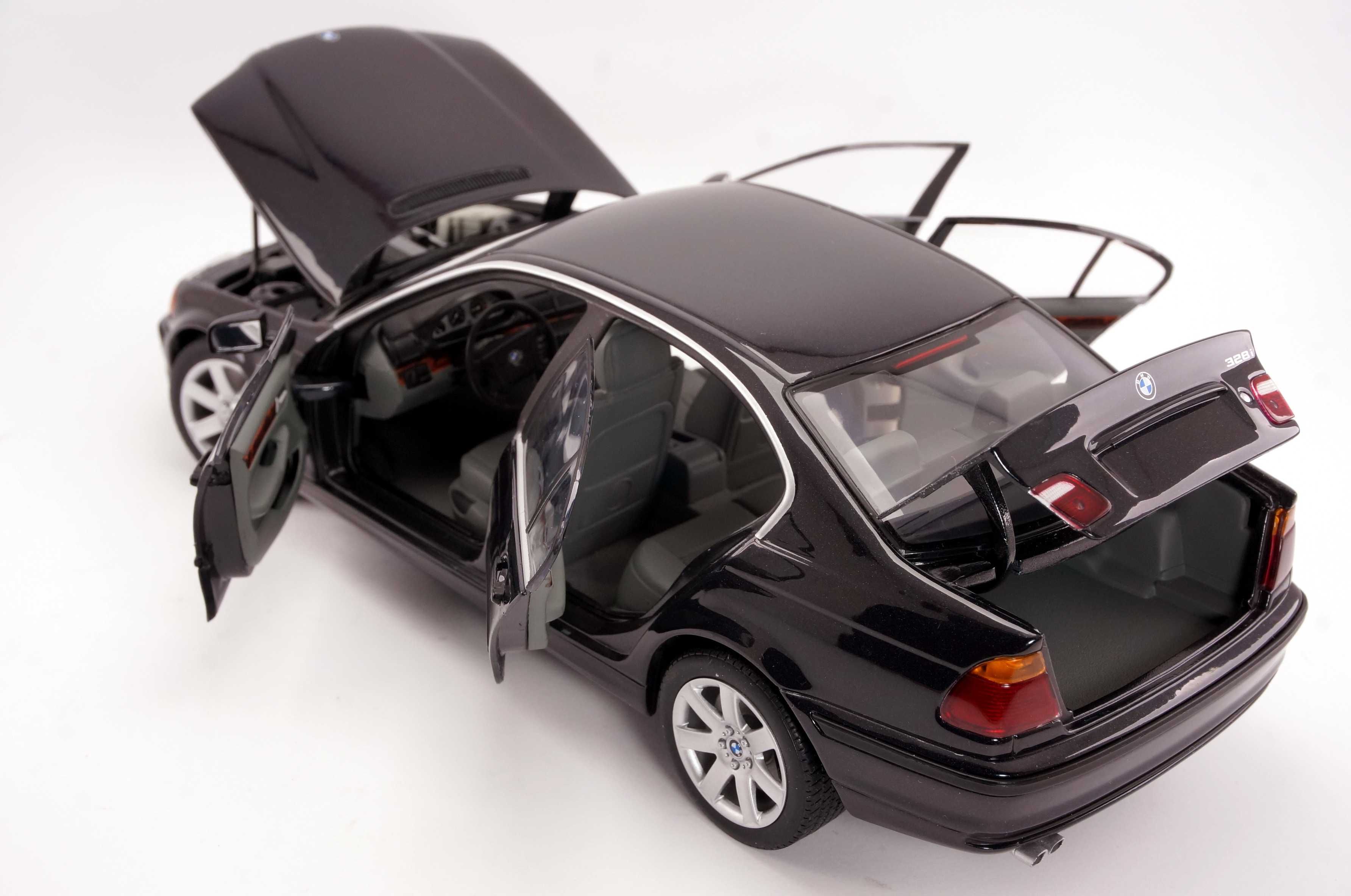 Модель UT Models 1:18 BMW 328i Sedan E46 (1998) Black