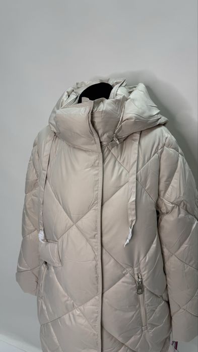 Жіночий подовжений пуховик CLASNA 46,52 полномерный