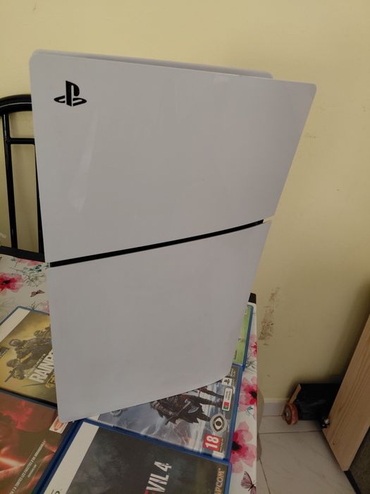 Playstatio 5 Slim c/ leitor de discos+ acessórios+ 5 jogos