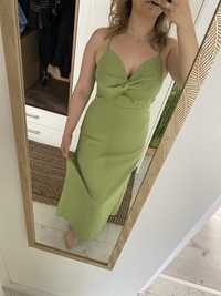 Piekna zielona sukienka z odrytymi plecami, rozporkiem, zakladkami