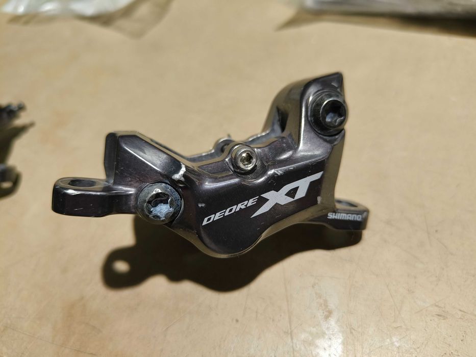 Zaciski Shimano Deore XT BR-M8120 + klocki Galfer/Jagwire
