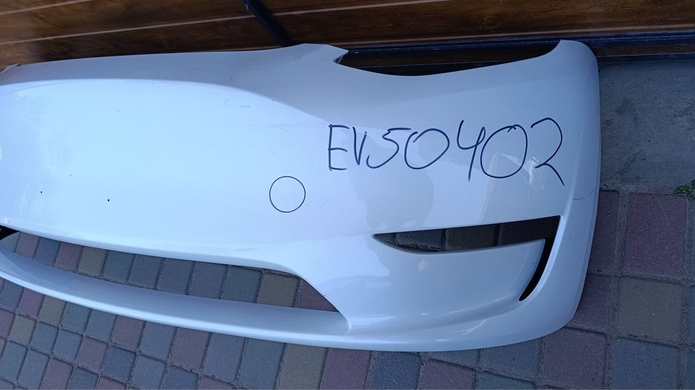 Бампер передній tesla model y 23- ev50402