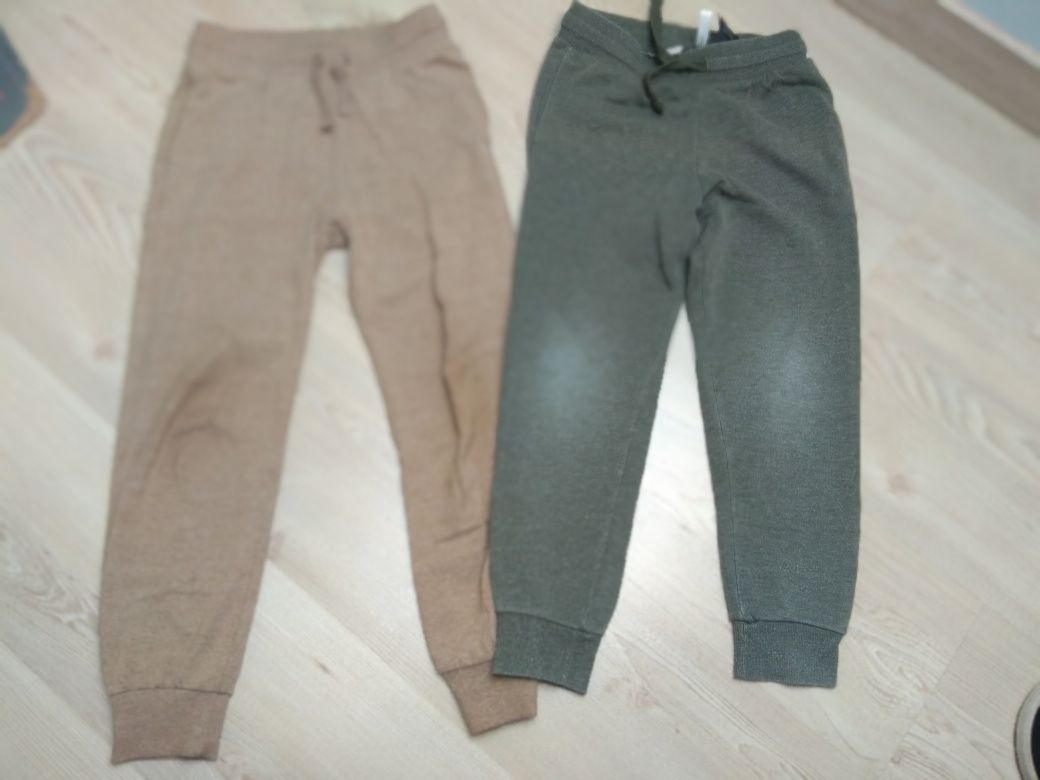 Dwie pary spodni dresowych H&M 128