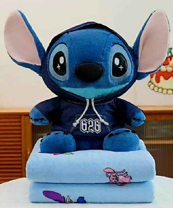 Maskotki z kocem w środku