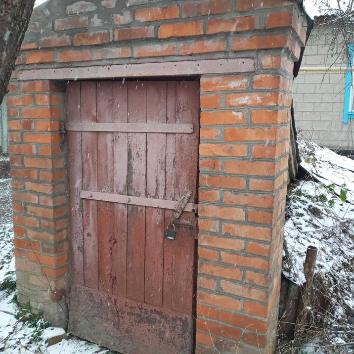 Продам дом с участком г. Ромны