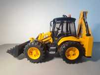 Jcb 5cx koparko-ładowarka bruder 02454 + mini figurka