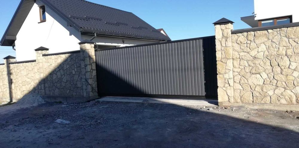 Відїздні ворота Двигуни.Наповнення воріт.ЖалюзіРанчоШтахети.Профнастил