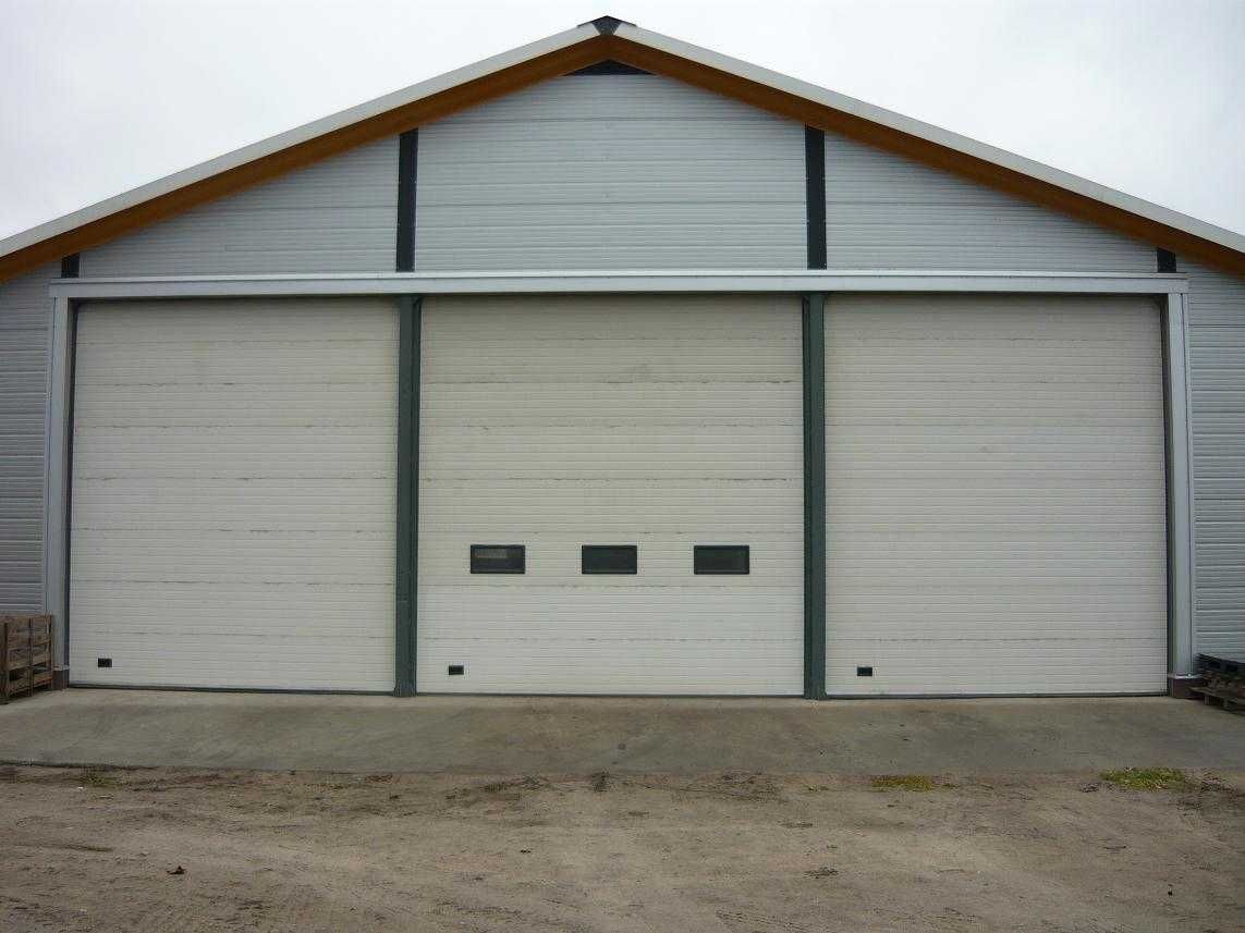 Duże drzwi garażowe 3x3 m, bramy segmentowe przemysłowe. Krótki termin