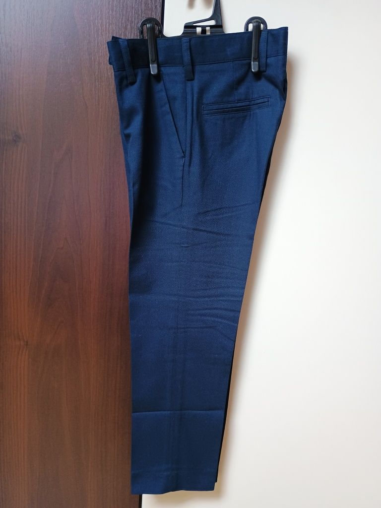Eleganckie spodnie na kantkę r.122