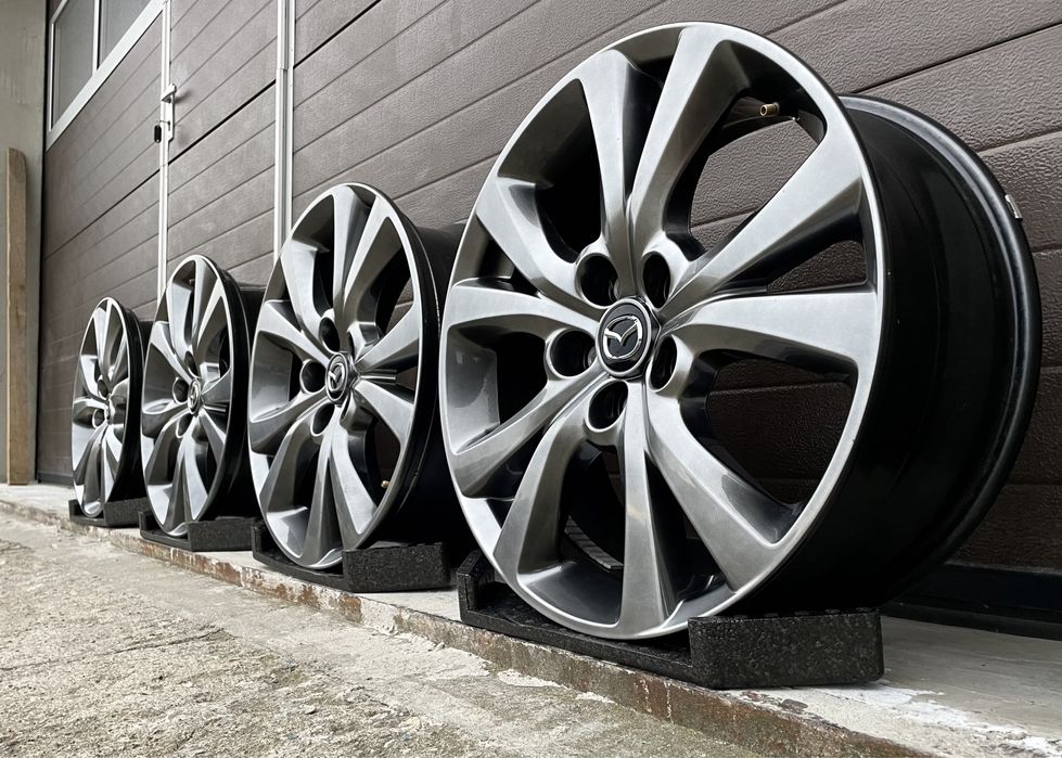4x felgi aluminiowe 5x114,3 r18 et45 7J Alufelgi Oryginał Mazda Grafit