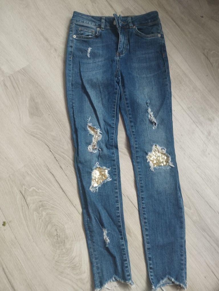 Spodnie damskie jeansy