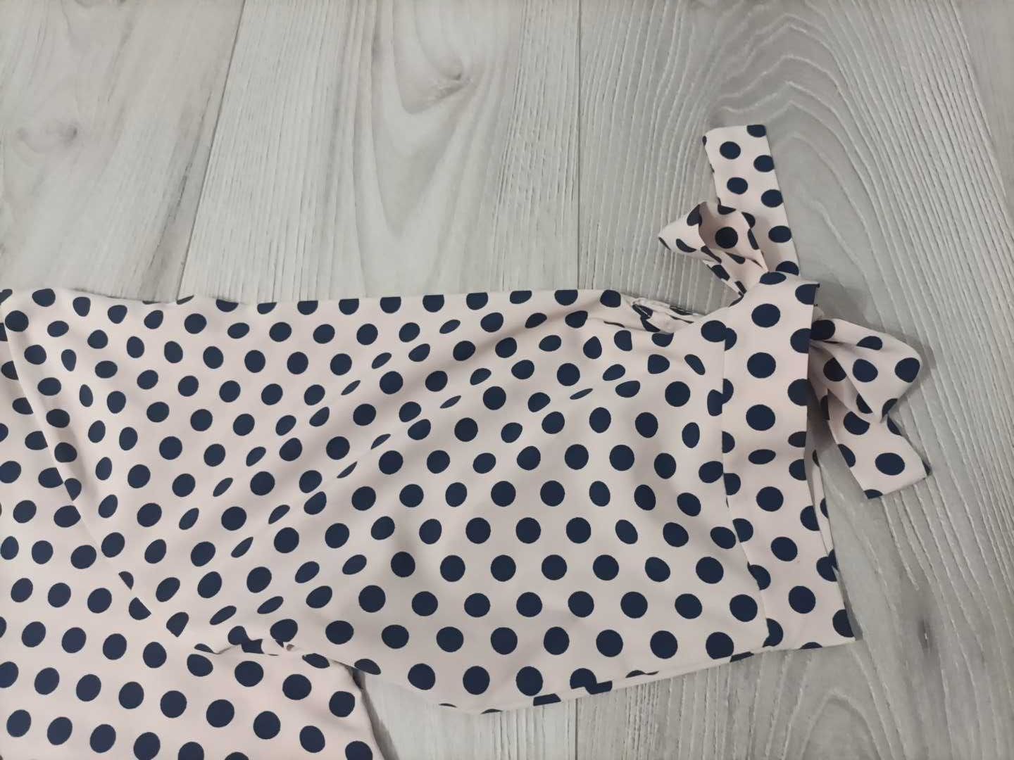 Elegancka bluzka z rękawem 3/4 w rozmiarze 46